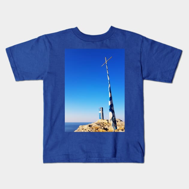 Greek flag waving on a blue and white pole with a cross Kids T-Shirt by Kate-P-